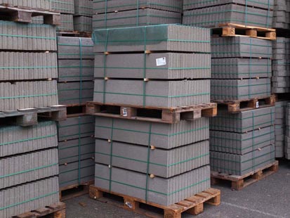 image showing stacked pallets with top sheets
